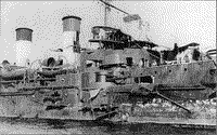 Крейсер "Олег" в период проведения работ по устранению боевых повреждений, июнь 1905 года