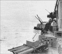 Крейсер "Ворошилов" готовится к торпедным стрельбам и отражению учебной торпедной атаки, 1950-е годы